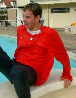 pool boy with anorak in pool